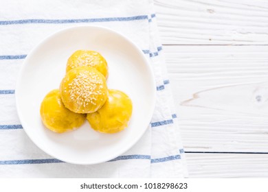 Chinese Pastry Or Moon Cake Filled With Mung Bean Paste And Salted Egg Yolk - Asian Dessert