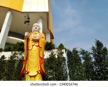 Chinese Priest Statue