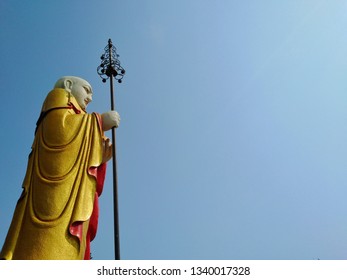 Chinese Priest Statue