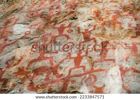 Chinese rock painting depicting human figures, Unesco World Heritage site in Guangxi