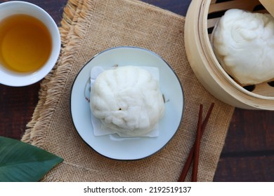 Chinese Steamed Bun At Top View On Sackcloth Of Wood Table