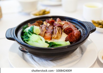 Chinese Steamed Pork And Liver Sausages With Vegetables And Rice In Claypot Is A Popular Dish In Cantonese Dim Sum Restaurants In Hong Kong And Southern China.