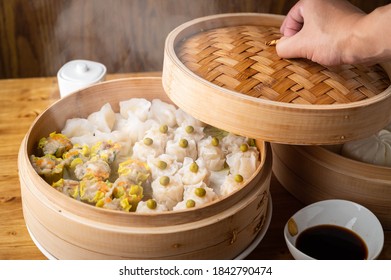 chinese steamed shumai in bamboo steamer