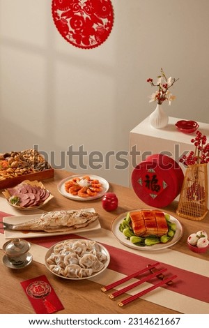 Chinese style festive atmosphere, wooden dining table, various snacks, pastries, lanterns, gifts, red envelopes, fish, Chinese food, dumplings(Translation:The text means auspicious and good luck)