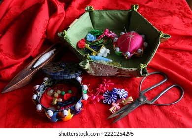 chinese tailor accessories in silk background