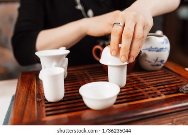 Chinese Tea Ceremony. Girl Making Chinese Tea