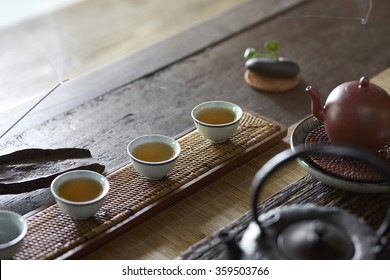 Chinese tea set on old wooden table