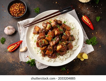 Chinese Traditional Cuisine Sticky Braised Pork Belly With Rice On White Plate