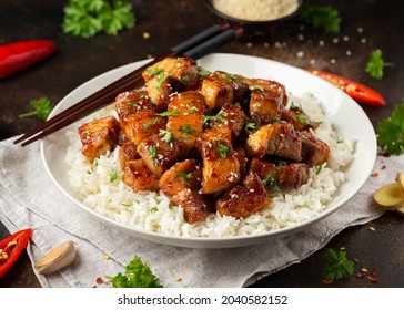 Chinese Traditional Cuisine Sticky Braised Pork Belly With Rice On White Plate.