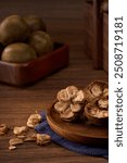 Chinese traditional medicine monk fruit, wooden background atmosphere