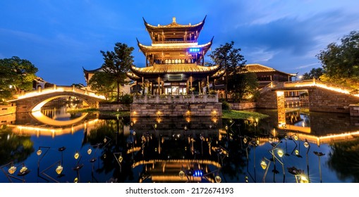 Chinese Traditional Pavilion Building In Jiaxing, China. Ancient Chinese Architecture At Night.