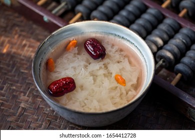 Chinese tremella sugar soup  (Tremella fuciformis)  on a bamboo background
