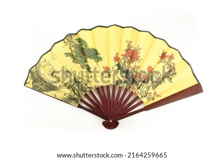 Chinese vintage style fan made of wood isolated on white background
