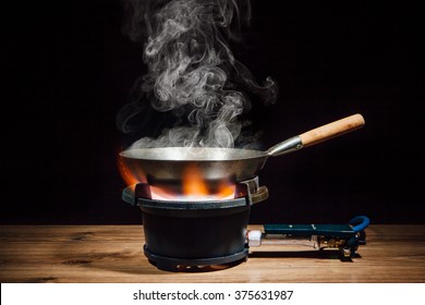 Chinese Wok Pan On Fire Gas Burner