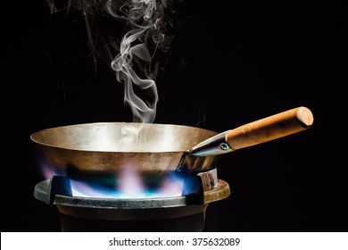 Chinese Wok Pan On Fire Gas Burner