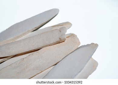 Chinese Yam Dioscorea Polystachya) Also Known As Chinese Potato, Huaishan, Nagimo, Cinnamon Vine, Closeup And Selective Focus On White Background.