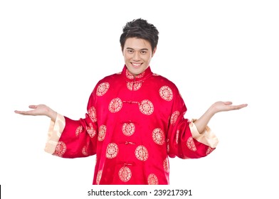 Chinese Young Man With Tradition Clothing With His Hands Into The Air