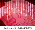 Chinese Yuan going down red graph with arrows, business and finance background. Currency of China with red arrows backdrop