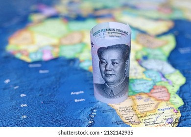 Chinese Yuan On The Map Of Africa Continent. Trading Between China And African Countries, Tourism, Economy And Investment