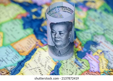 Chinese Yuan On The Map Of Saudi Arabia And Iran. Concept Of Buying Oil, Economic Cooperation Between The Beijing And Persian Gulf Countries