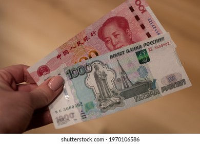 Chinese yuan and Russian ruble banknotes. Financial system of Russia and China. De-dollarization. World monetary system. China vs Russia.