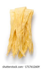Chinese Yuba (dried beancurd sticks) isolated on white background - Shutterstock ID 1717612609