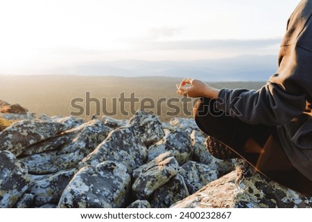 Chin-mudra, the gesture of consciousness, the practice of meditation in the mountains, touching the fingers of one hand, yoga asana, meeting the dawn in the mountains, krishna consciousness