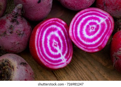 Chioggia striped or candy stripe beet whole and sliced in burlap sack on wooden table - Powered by Shutterstock