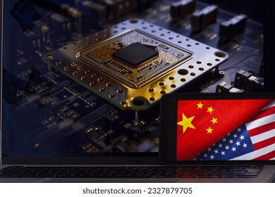 Chip shortage and US-China trade conflict. Global chip shortage crisis and China-United States trade war concept. China flag and US flag and rare metal chip in the background. - Shutterstock ID 2327879705