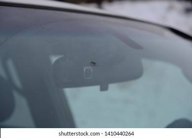 Chip In A Windshield Of Car. Cracked Windshield.