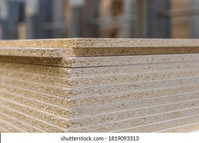 Chipboard sheets in the store, texture. Lumber is sold at the supermarket or warehouse. Close-up with copy space. - Shutterstock ID 1819093313