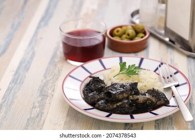 Chipirones En Su Tinta, Small Squid Cooked In Black Ink, Spanish Basque Cuisine