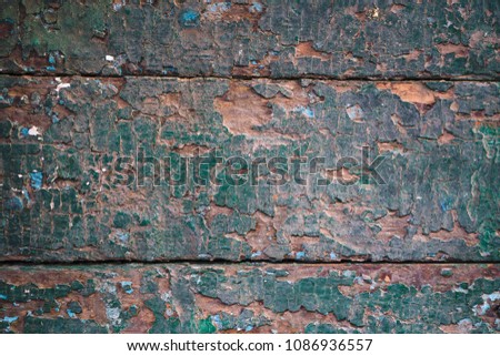 chipped paint on old wooden boards