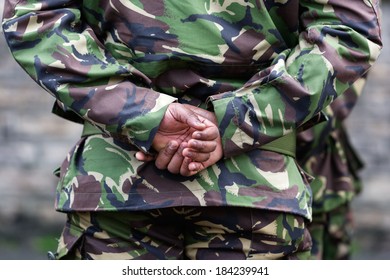 CHIPPENHAM, UK - JANUARY 19, 2012: A Soldier From The 9th Regiment Royal Logistics Corps Stands At Ease After A Military Parade.