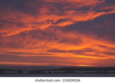 Chipping Camden Cotswolds UK
Lenticular Clouds And Dramatic Winter Sunrise With Orange Sky