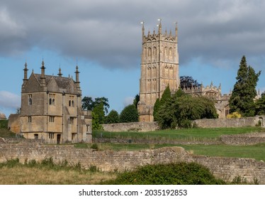 Chipping Campden, UK. August 2021. Rural Cotswold Peaceful Scene. On Left Is Jacobean Era East Banqueting House, On Right The West Tower Of Medieval St James' Anglican Church.