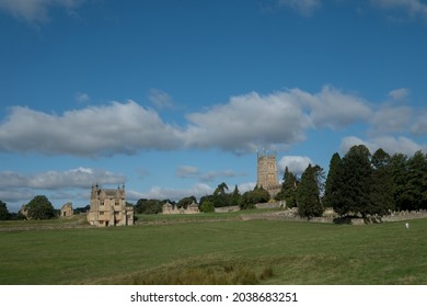 Chipping Campden, UK. August 2021. Rural Cotswold Peaceful Scene. On Left Is Jacobean Era East Banqueting House, On Right The West Tower Of Medieval St James' Anglican Church.