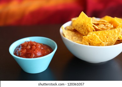 Chips And Salsa In Bowl Spicy Red Dip With Tortilla Strips On Table