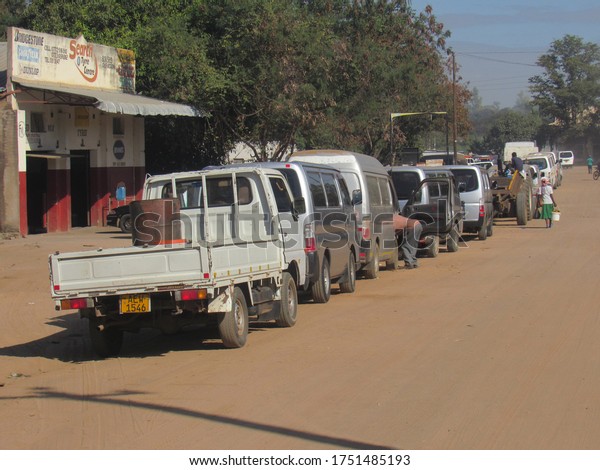 Chiredzi,Zimbabwe,03 June 2020. Fleet of cars\
lining up for fuel or gas at a service station because of shortage\
of fuel in the\
country.