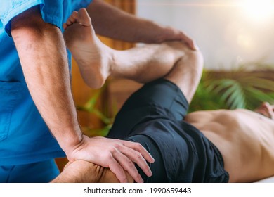 Chiropractic Manual Manipulation Spine Adjustment. Therapist Treating Patient’s Back. Discus Hernia Or Herniated Disc Treatment.