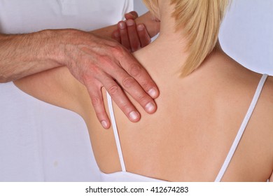 Chiropractic, Osteopathy, Dorsal Manipulation. Therapist  Doing Healing Treatment On Woman's Back . Alternative Medicine, Pain Relief Concept