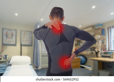 Chiropractic, Osteopathy, Physiotherapy, Sport Injury Rehabilitation. Alternative Medicine, Pain Relief Concept. Man Patient Suffering From Back Pain During Medical Exam.