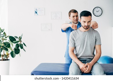 Chiropractor Massaging Back Goodlooking Man On Stock Photo 1420411634 ...