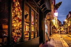 A Chirstmas Night View Of Shambles, A Historic Street In York Featuring Preserved Medieval Timber-framed Buildings With Jettied Floors, UK
