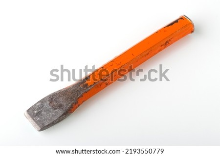 Chisel or beard, impact-cutting tool for working metal or stone. Tool on white background