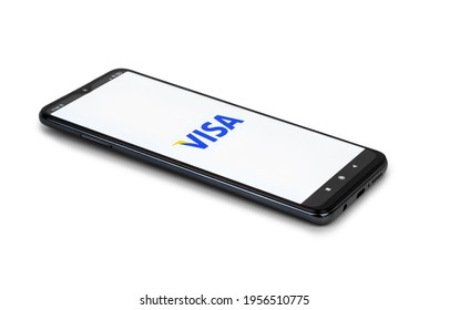 Chisinau, Moldova - April 15, 2021: Visa logo on phone screen stock image. Isolated on white background