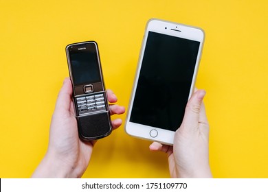 Chisinau, Moldova - June 2, 2020: Old Nokia Phone And New IPhone Comparison.