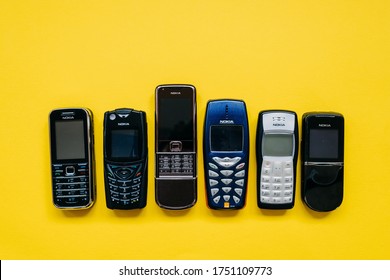 Chisinau, Moldova - June 2, 2020: Collection Of Old Nokia Mobile Phones On Yellow Background.