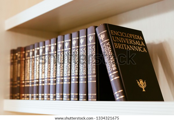 Chisinau, Moldova - March 2019: Encyclopedia Britannica - Complete stack of "Enciclopedia Universală Britanica" composed of 16 volumes in romanian language. 