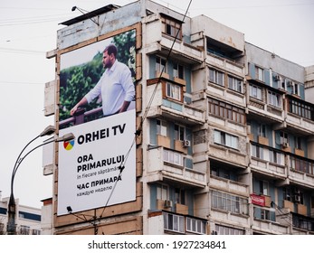 Chisinau, Moldova - Nov 1, 2018: Large OOH Advertising Banner In Central Chisinau With Orhei TV On The Large Facade Of Old Communist Building